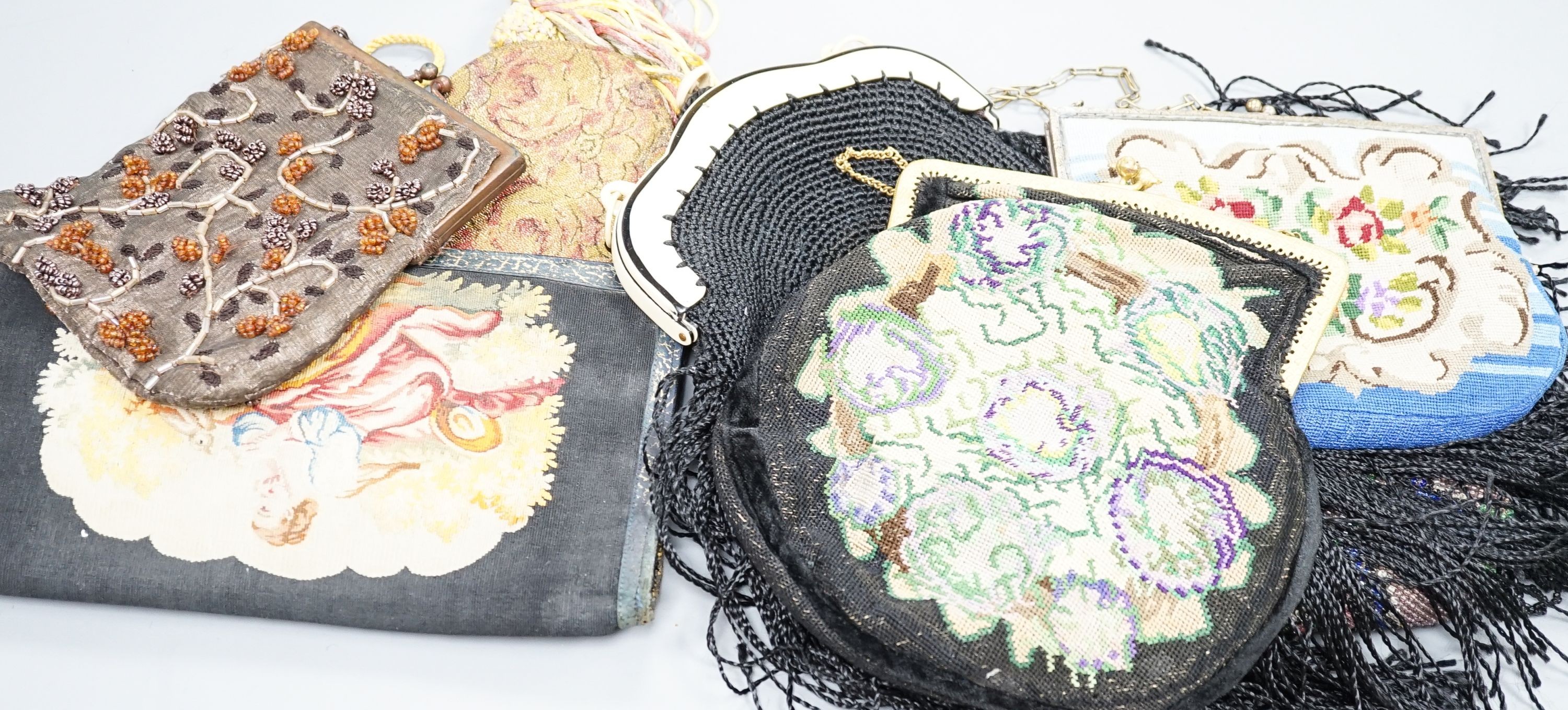 A fine tapestry clutch bag together with a collection of beaded petit point and lurex evening bags (7)